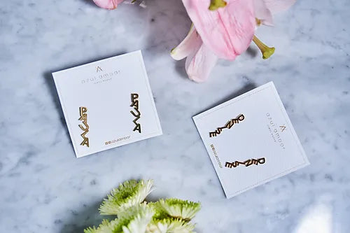 Aretes Marsella name vertical